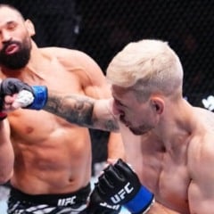 Kyle Daukaus acerta soco em Michel Pereira durante o UFC Xangai Jeff Bottari/Zuffa LLC