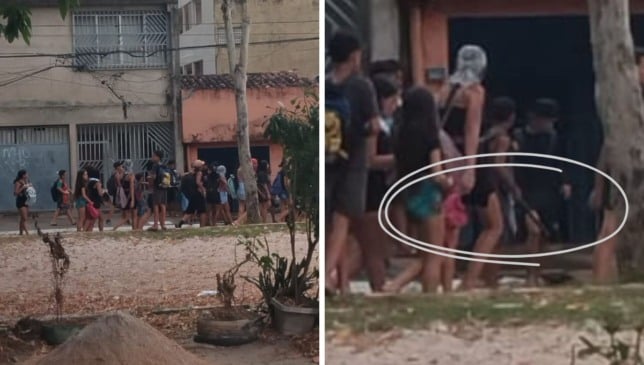 Movimentação intensa no bairro da Pedreira, em Belém: jovens disputam bombons de São Cosme e Damião, tradição marcada por fé e generosidade.