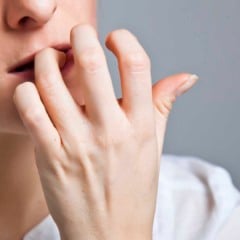 Woman in depression on gray background