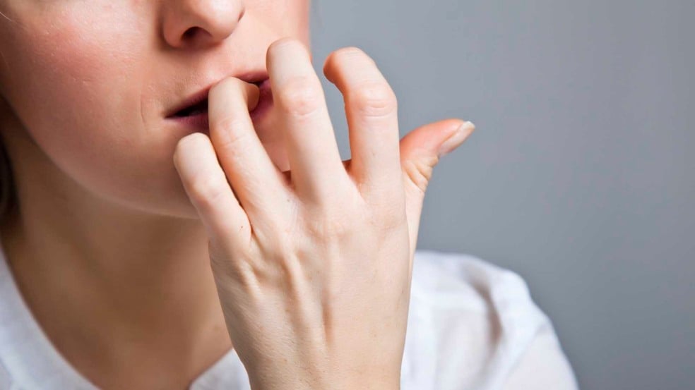 Woman in depression on gray background